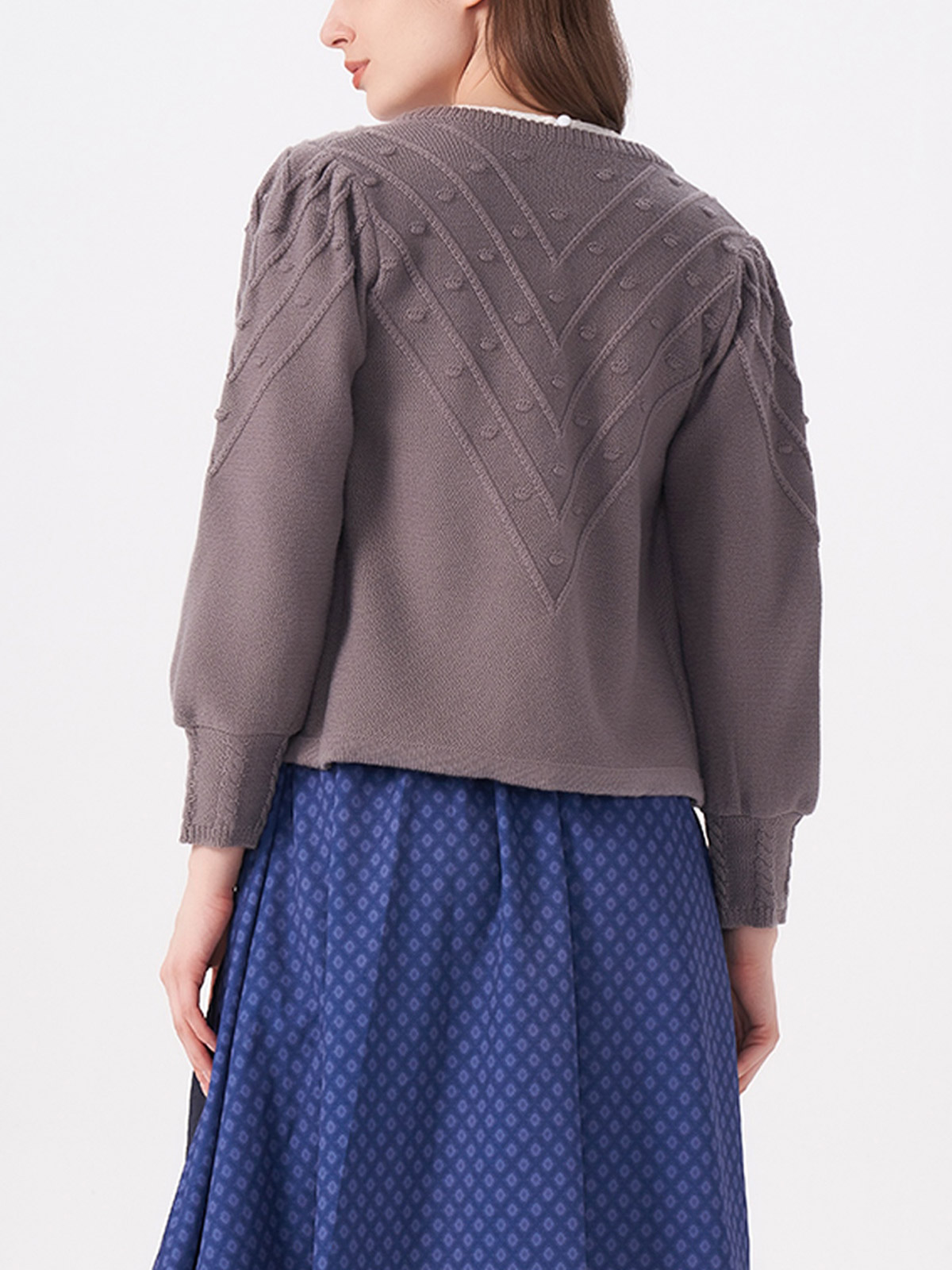 Beiges Dirndl in eleganter Strickoptik